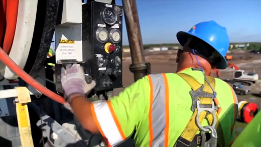 vacuum truck and worker