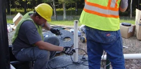 Koberlein staff working on pumps